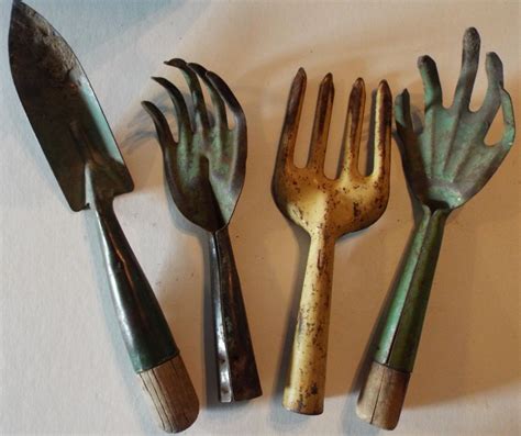 Great for garden supply shops, florists, landscapers office. Set of Vintage Antique Lawn and Garden Tools by ...