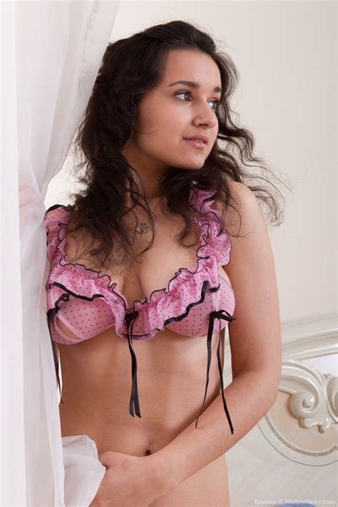 Busty blonde amateur stripping and playing with herself. Dark haired hottie Ramira plays on the bed in her ...