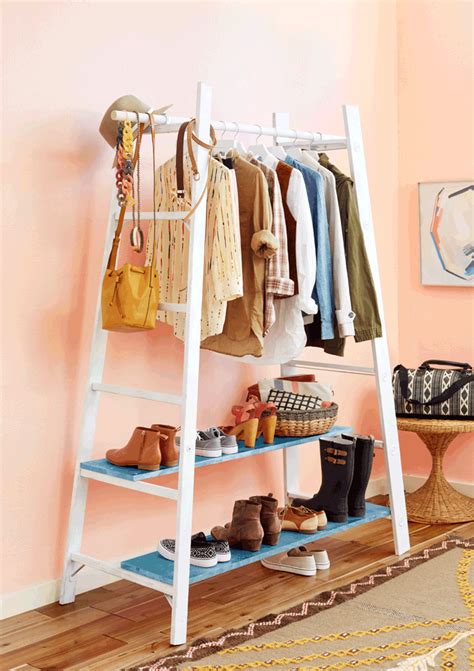 The other nice thing about this clothing rack is that you can use both the front and back bars to hang clothes, so it's got double the storage. Red Book DIY - Garment Rack - Emily Henderson