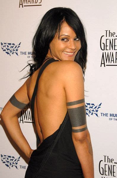 Persia white tattoos celebrity tattoos tattoo designs tattoo gallery this is actress persia white and poet saul williams on the first day they question of the day: Persia White's upper solid armband tattoo | Oberarm