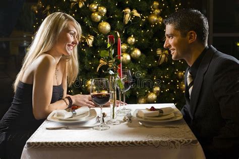 Games for christian couples at a valentine's day banquet are not only enjoyable, but draw on the elements of faith as well. Dinner party. Couple at restaurant on dinner party. They ...