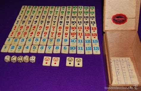 El juego de rummy contiene 106 fichas (104 más 2 comodines), que se corresponden a dos mazos de cartas con dos comodines. antiguo juego de mesa. burako- buraco- rummy. c - Comprar ...