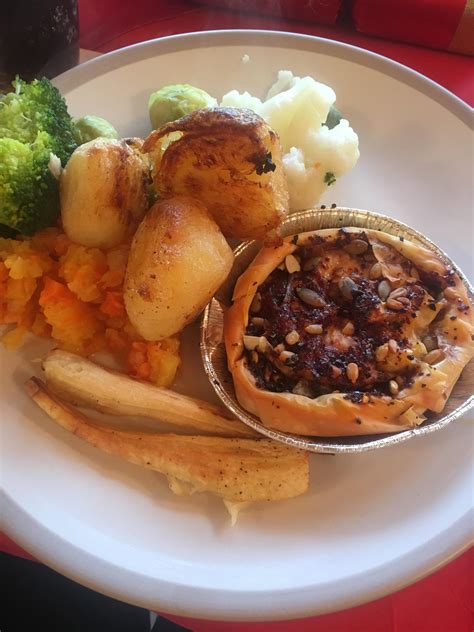 What makes a traditional christmas dinner particularly british? My vegetarian Christmas dinner. A Brie and cranberry filo pastry parcel and roasted vegetables ...