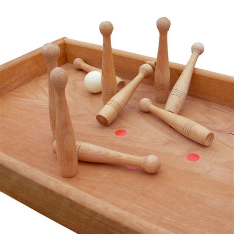 Make one of these game boards, and you can play with family and friends in the comfort of your home. Table-Top Bowling Alley buy at Sport-Thieme.co.uk