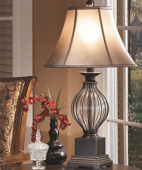 A traditional accent lamp can incorporate any of these design elements. Take a look at this Bronze Ondreya Table Lamp - Set of Two ...