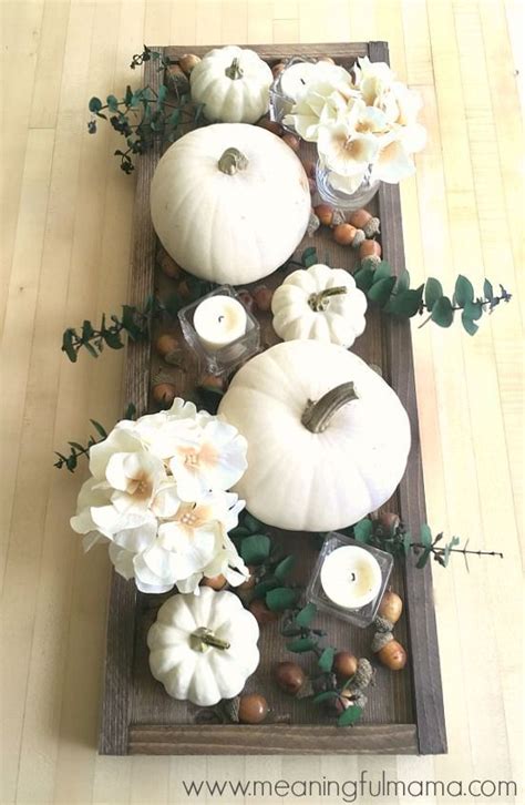Get inspired by these seasonal decorations for a festive home. Contemporary Fall Centerpiece Idea with White Pumpkins ...