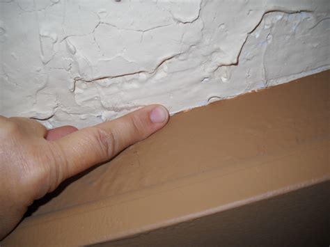 Popcorn ceilings can present a dangerous health hazard, but you can test them for asbestos and remove homeowners might install popcorn ceilings because they don't want to finish the ceiling it might require several coats of joint compound to achieve a smooth finish. How to Cover a Popcorn Ceiling With Plaster | Dengarden