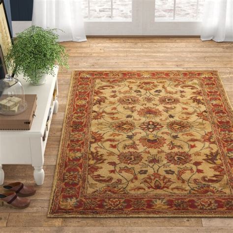 Now area rugs are another story because you can get to the underside! Birch Lane™ Niccolo Floral Handmade Tufted Wool Camel Area ...