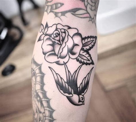 A famous rose design is a rose placed between wings. Classic Rose Tattoo Sometimes all you need to fill a space ...