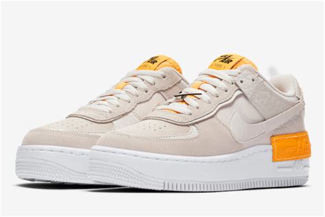 It's detailed with subtle hits of coral pink and unmissable hits of pollen orange that accentuate the. CU3446-001 Nike Wmns Air Force 1 Shadow Vast Grey Laser ...