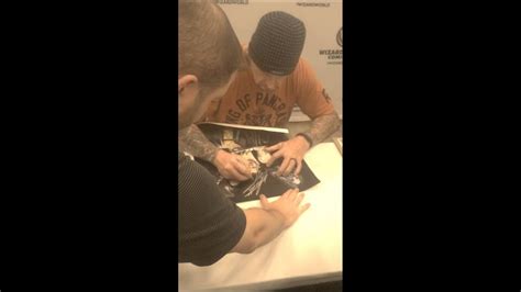 It ought to effortlessly complement the rest of the. The Undertaker signing my painting - YouTube