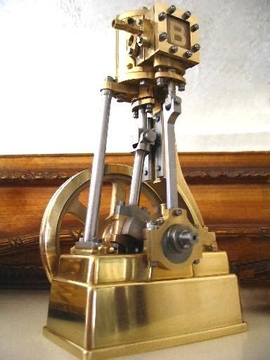 An engine that uses steam to produce power: Golden Steam Engine