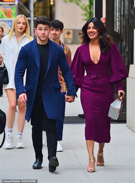 Last weekend, priyanka chopra and nick jonas got married, and the ceremony was very beautiful indeed; Priyanka Chopra holds hands with Nick Jonas alongside ...