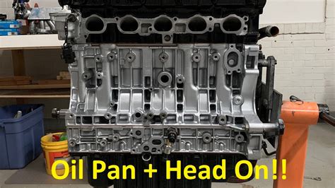 Remove upper cylinder head by very carefully tapping upward with a copper mallet at parting lugs and camshaft pulley end. Volvo 850 Build Part 4 - Oil Pan + Cylinder Head - YouTube