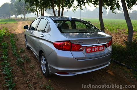 The 2014 honda city has been launched in india after almost two months of publicity overdrive. 2014 Honda City drive rear quarter 3