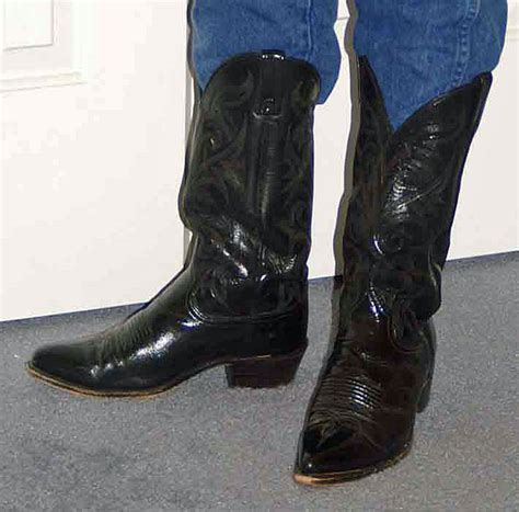 It won't kill you, but you won't want to do it again. Dan Post Black Dress Cowboy Boots