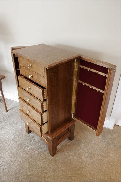 Taller jewelry boxes, like this one, allows you to hang and better display necklaces. Cherry Jewelry Armoire - FineWoodworking