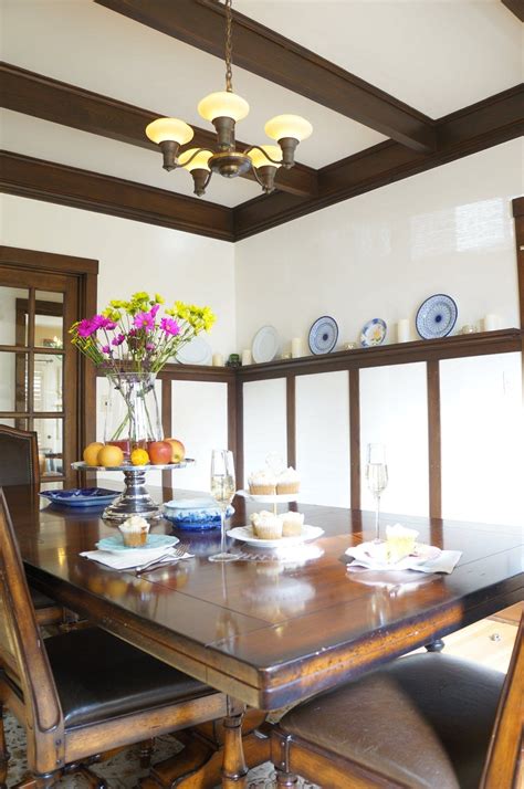 The craftsman dining room has a pretty yet simple light fixture. Jill & Chris' Refreshing Prairie-Style Craftsman Home in ...