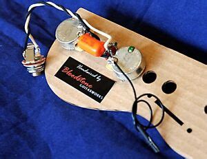 The first thing to note is that the les paul junior is wired entirely using braided guitar wire. Ready Built 2-Pot Les Paul Junior + SG Junior Wiring Upgrade Loom Harness Kit | eBay