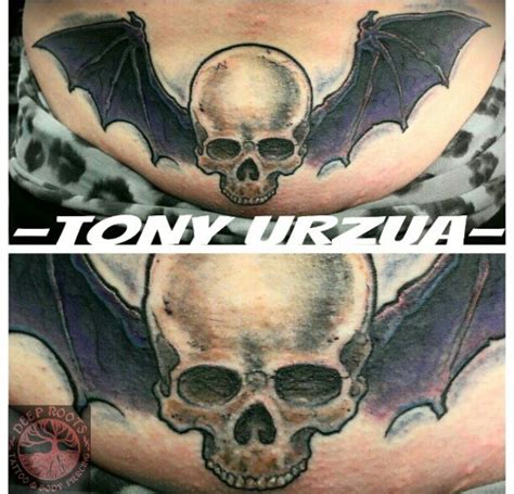 Nicholas hart @ deep roots tattoo in seattle, wa. Skull and bat wings by Tony Urzua at Deep Roots Tattoo and Body Piercing in Seattle. #tattooshop ...
