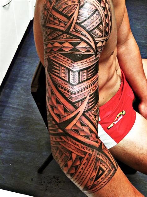 Also, notice the circular pattern on the chest which is a symbol of the sun and signifies riches, brilliance and leadership. 37 Tribal Arm Tattoos That Don't Suck - TattooBlend