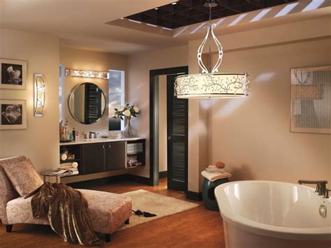The black monograms pop against the white shades and tie into the mirror frame and wallpaper, creating a modern lighting look. 13 Dreamy Bathroom Lighting Ideas | HGTV