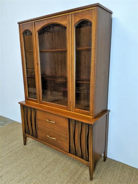 A late nineteenth century china cabinet with glazed door and heavily inlaid border 75 cm wide, 30 cm deep, 97 cm high. Mid Century Modern Vintage China Cabinet, Stylized Doors ...