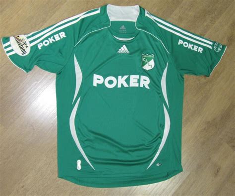 The chest area has a gradient effect that sees the club's primary green transition to white. Deportivo Cali Home football shirt 2007.