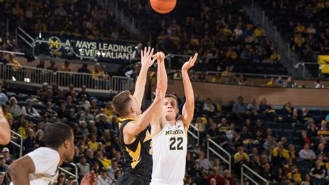 It was classic paul, a bulldog, eventually ripping the ball away and firing it off robinson to win the possession. Duncan Robinson - Men's Basketball - University of ...