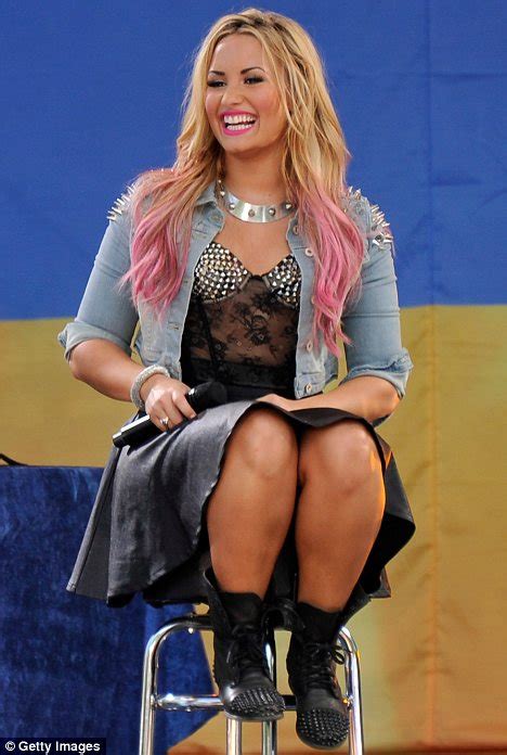 I'm not looking for a job. Demi Lovato almost flashes her underwear as her skirt ...