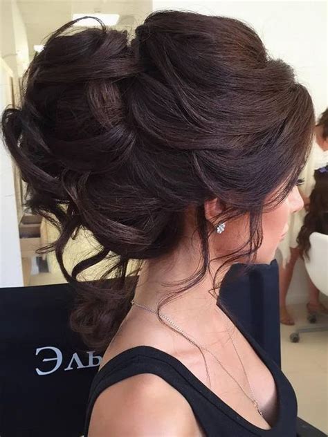 Whether your hair is naturally long or you use extensions, joan smalls' high, curly ponytail looks totally put together and takes the messier the braid, the better, as effortlessly executed by blake lively. 17 Of The Loveliest Updos For Long Hair To Do On Weddings ...