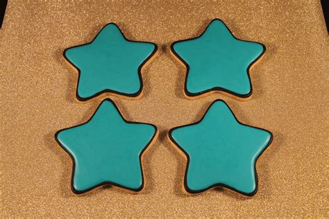 Star sugar cookies moon cookies homemade sugar cookies sugar cookie bars sprinkle cookies christmas sugar cookies cookie box royal icing learn how to decorate sugar cookies from start to finish! teal stars | Sugar cookies decorated, Cookie decorating, Star cookies