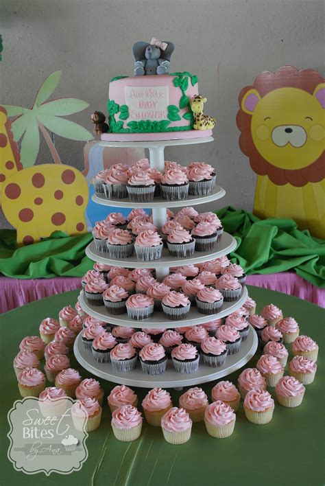 This cake will have all the cute animals that can be seen on a safari. Girl Jungle theme baby shower cake/cupcake tower | Baby ...