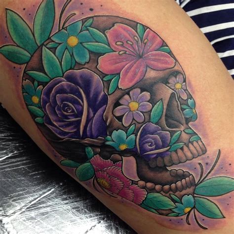 Maybe you would like to learn more about one of these? Tattoos by Craig Holmes @ Iron Horse Tattoo Studio (Day of the dead floral skull on the thigh ...