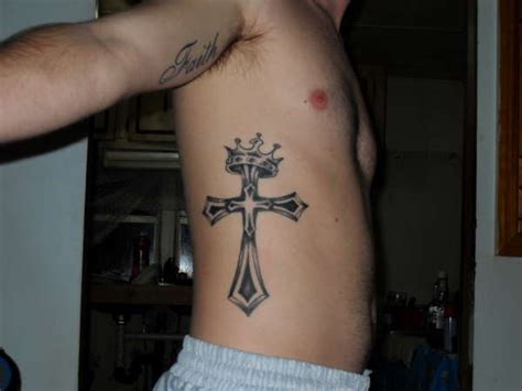 Drawing a unique crown tattoo on your body must have unique inspirations for it to stand out. cross with crown tattoo