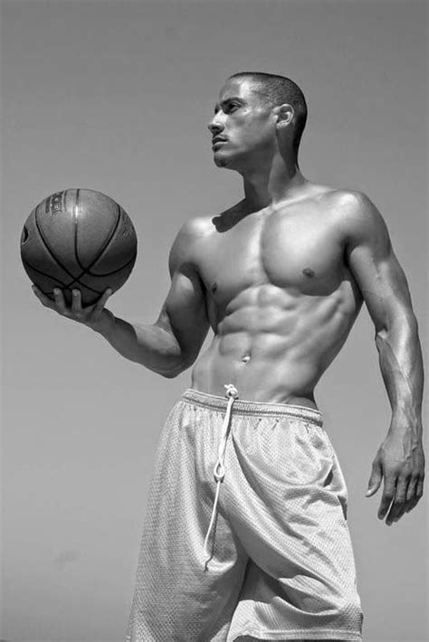 A basketball player rolling a ball from his left hand to his right hand. Basketball | Black male models, Hot dudes, Hot male models