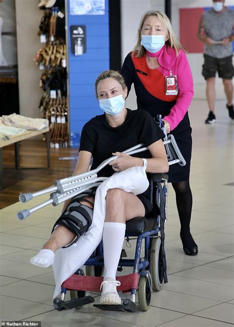 Weight, 7 pounds, 3 ounces. Allison Langdon is pushed through Gold Coast Airport in a ...