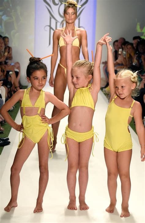 05:19 the kids of live staff members model the latest kids' swimwear. Child models in bikinis spark controversy at fashion show