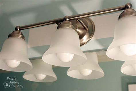 This video shares how to replace your drab bathroom l. Changing Out a Light Fixture (Bye-Bye Hollywood Strip ...