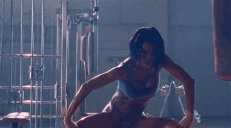 In the clip, she dances around an old gym in nothing but a sports bra and thong—and she looks incredible. Enjoy These GIFs of Teyana Taylor Slaying in Kanye West's "Fade" Visual