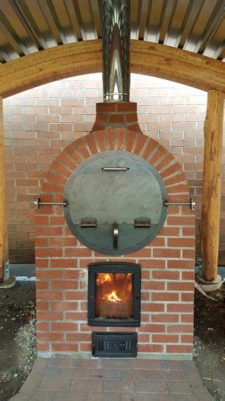 If you find building a cob oven or cement outdoor pizza oven too laborious, perhaps you'd like you don't have to worry about the dome as the oil barrel itself makes the dome. Barrel Oven at Portland Waldorf School in 2020 | Wood ...