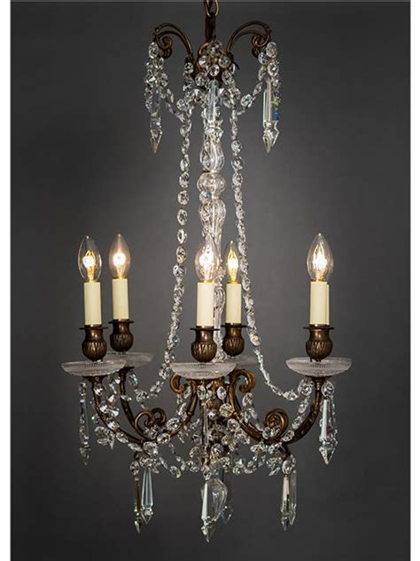 Chandeliers celebrate a history that hearkens back long before the emergence of electric light. Pin on Antique Lighting // Restoration, Art deco, vintage ...