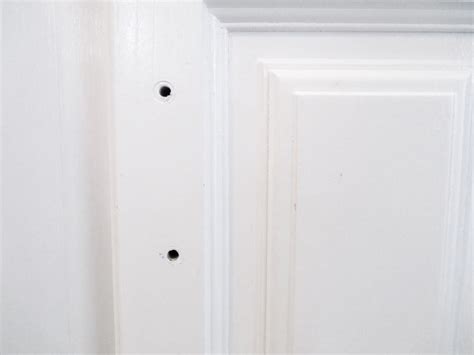 A new door jamb with decorative trim can make a dramatic enhancement. Lovely Imperfection - How To Fill Holes in Cabinet Doors ...