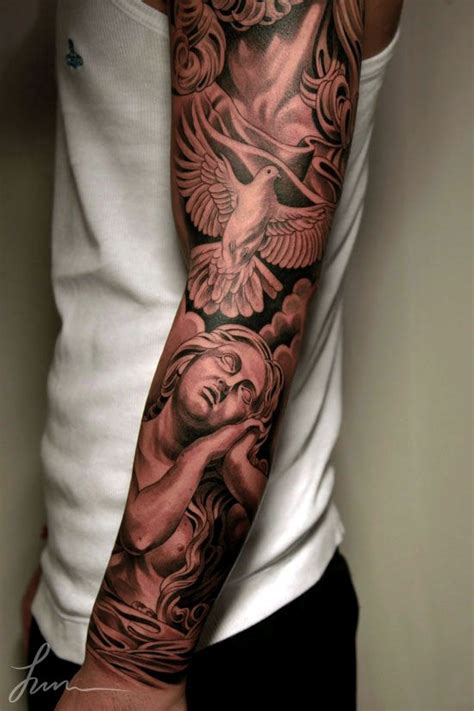 Opt for heaven gate tattoo on one arm sleeve and a demigod tattoo design on other sleeve like this. 50 Awe-Inspiring Sleeve Tattoo Design and Ideas