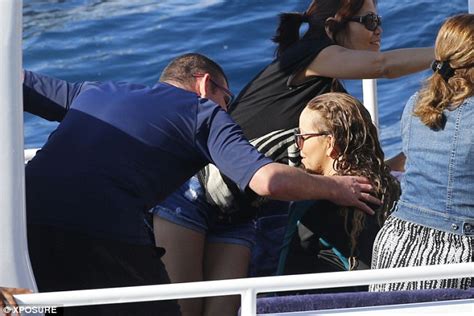 How was your experience with this page? Mariah Carey suffers a nip slip in Italy with James Packer ...