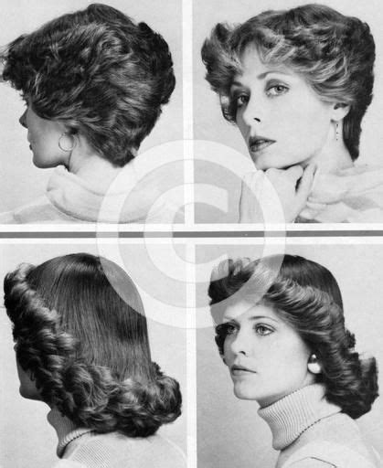 A good early 1970s hairstyles for women that consisted of shorter hair over the top, coupled longer hair at the backside; Image from http://watermarked.heritage-images.com/1650213 ...
