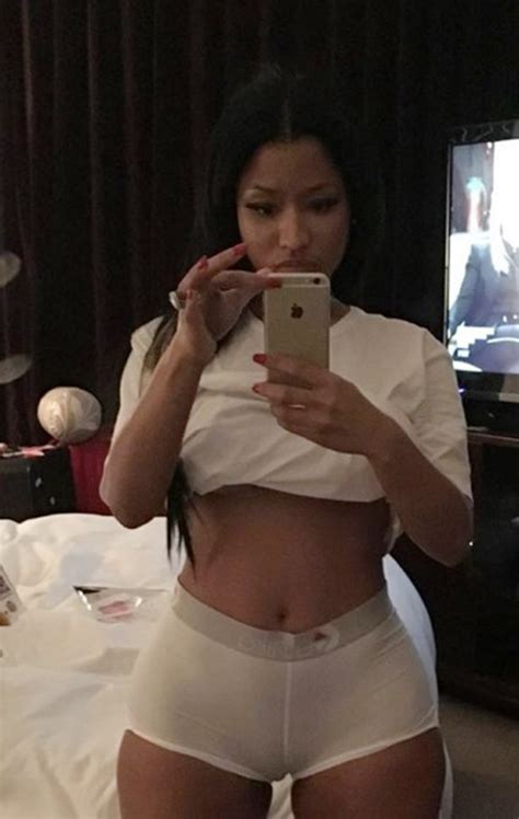 Blue pink green floral print. Nicki Minaj pokes fun at her camel toe in eye-popping ...