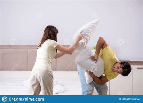 Check spelling or type a new query. The Wife And Husband Having Pillow Fight In Bedroom Stock ...