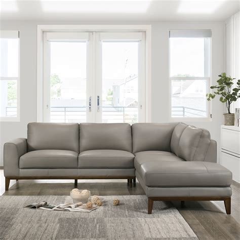 This particular movement occurred, especially, in architecture. Mid-Century Modern Milton Gray Leather Sectional Sofa ...
