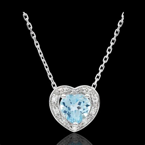 Bijou très fin qui se porte facilement et s'offre à toutes les occasions. Collier Coeur Enchantement - topaze bleue - or blanc 9 ...